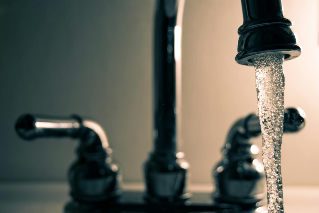 faucet with water running